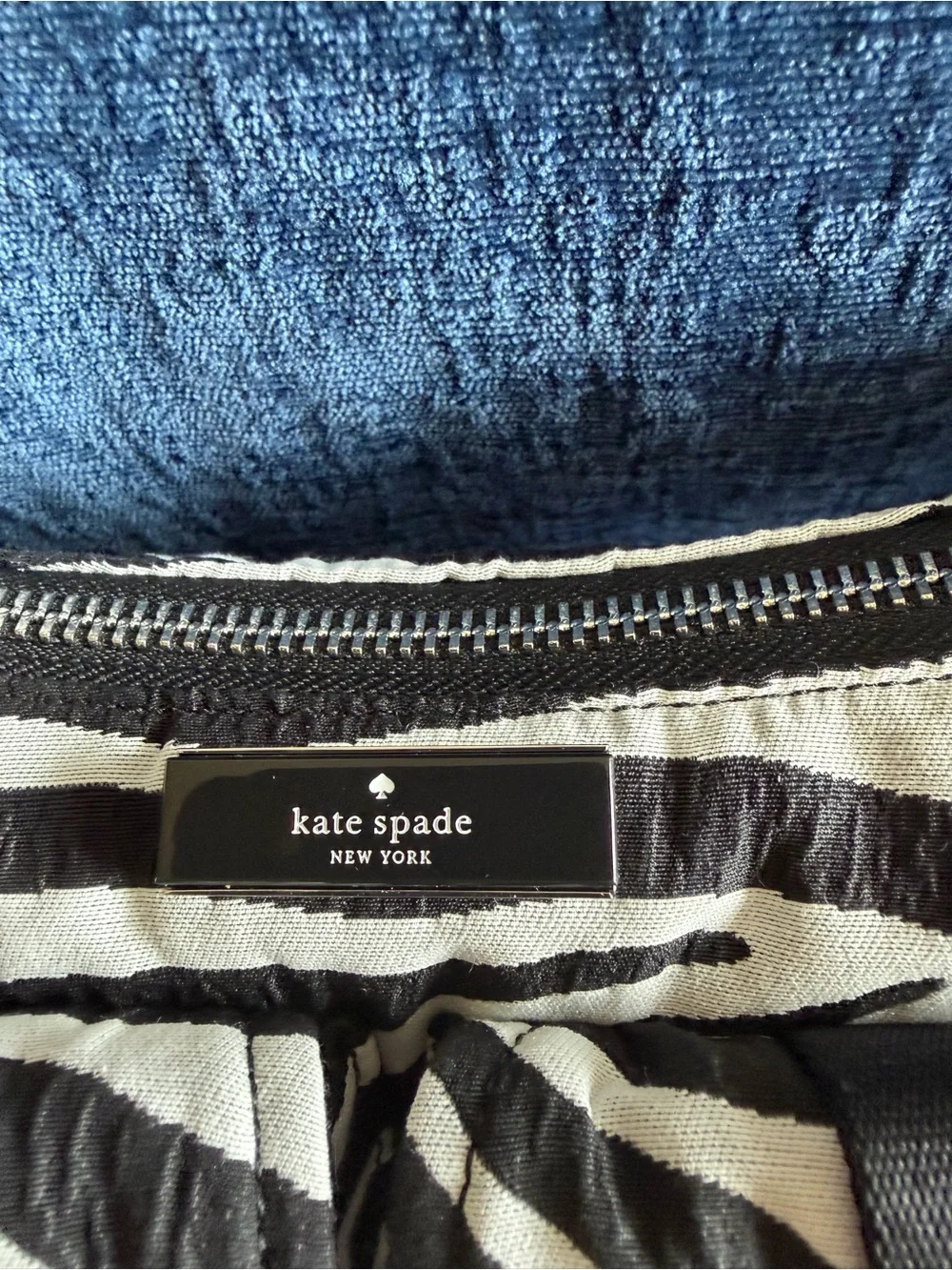 Kate Spade Carter Zebra Cargo Crossbody Bag in black and white
